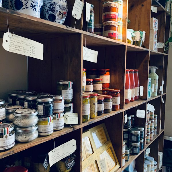Jars of preserves and provisions on shelves